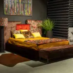 Letto imbottito con testiera arancio – altra vista – Confort Salotti